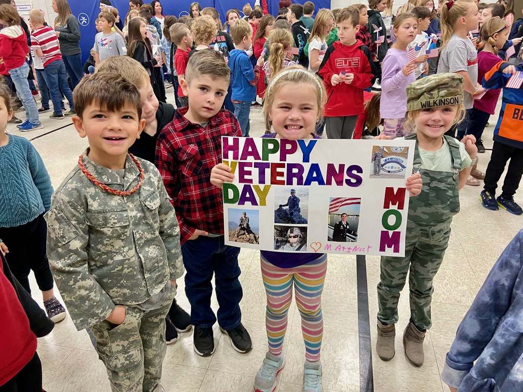At a Veterans Day assembly on Friday, Southwest Principal Brian Hofer welcomed over 30 veterans in attendance and introduced four students who read personal essays about the what the day means to them